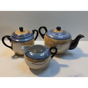 Teapot, creamer and‎ sugar made in Japan